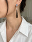 Dong Earrings